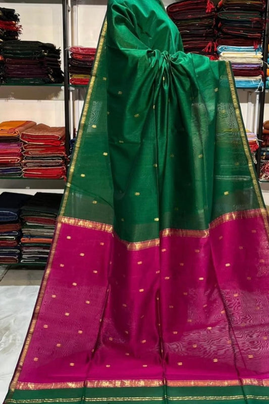 Graceful Green Silk Saree with Pink Zari Border